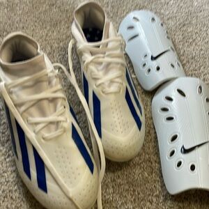 Adidas cleats  and shin guards